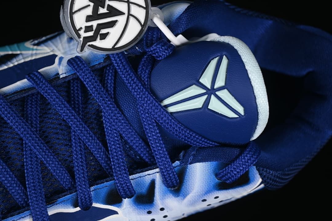 Tongue logo and blue laces on the Kobe 5 Protro