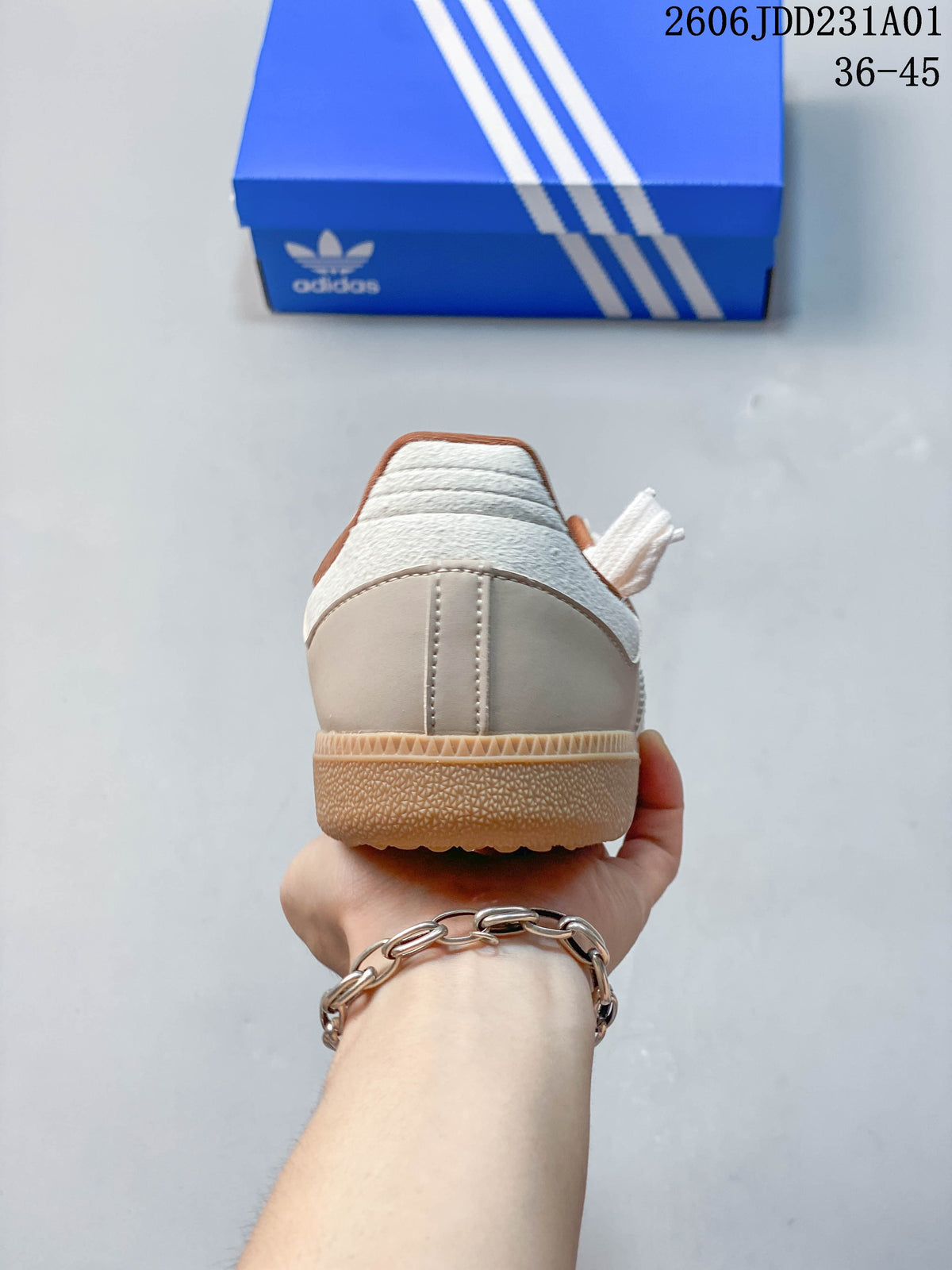 Rear view of a light neutral Adidas Samba OG sneaker