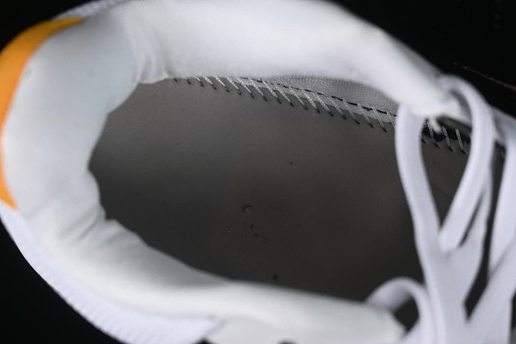 Close-up inside the shoe showing the lining and stitching