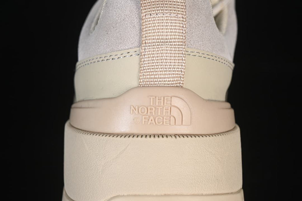 Rear view of heel pull tab and embossed logo