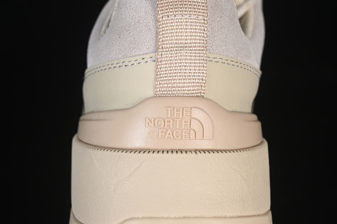 Rear view of heel pull tab and embossed logo