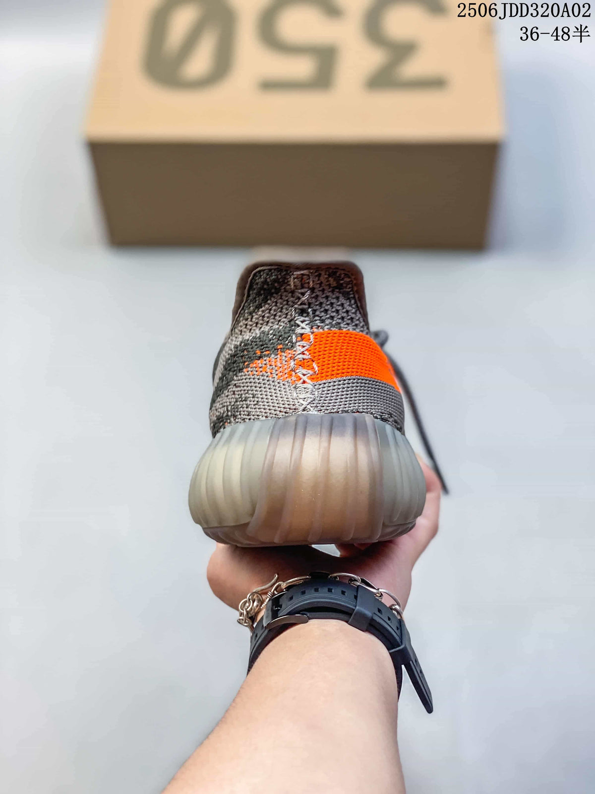Rear view showing the gray knit heel and translucent ribbed sole of the sneaker.