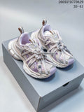 Pair of silver and lavender Balenciaga Phantom sneakers on a box