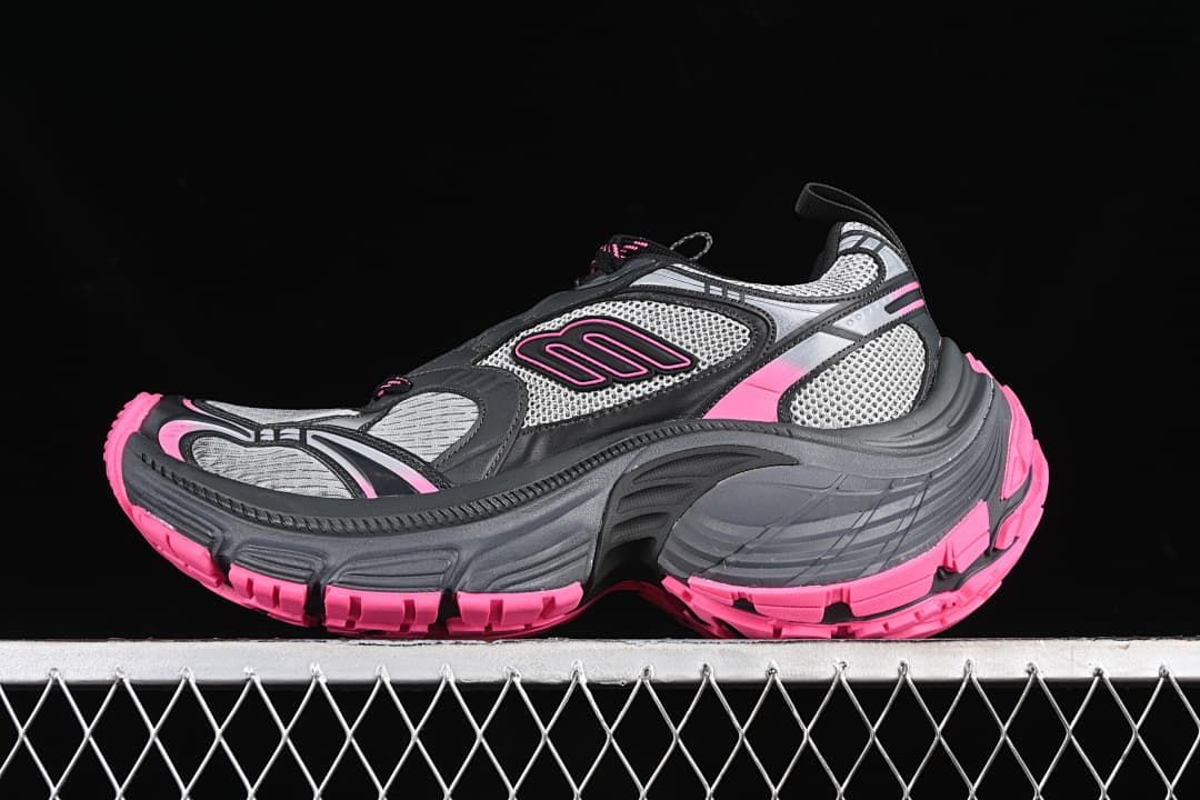 Balenciaga Track Sneaker in grey, black and bright pink, shown from the side