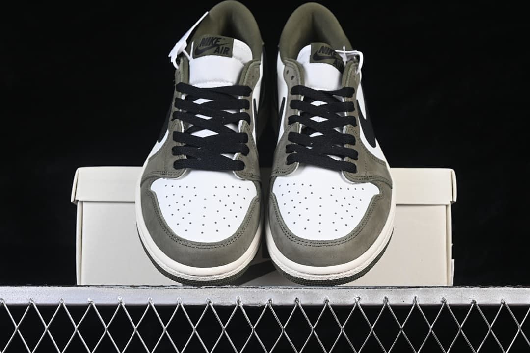 Front view of the pair showing the perforated toe boxes and laces