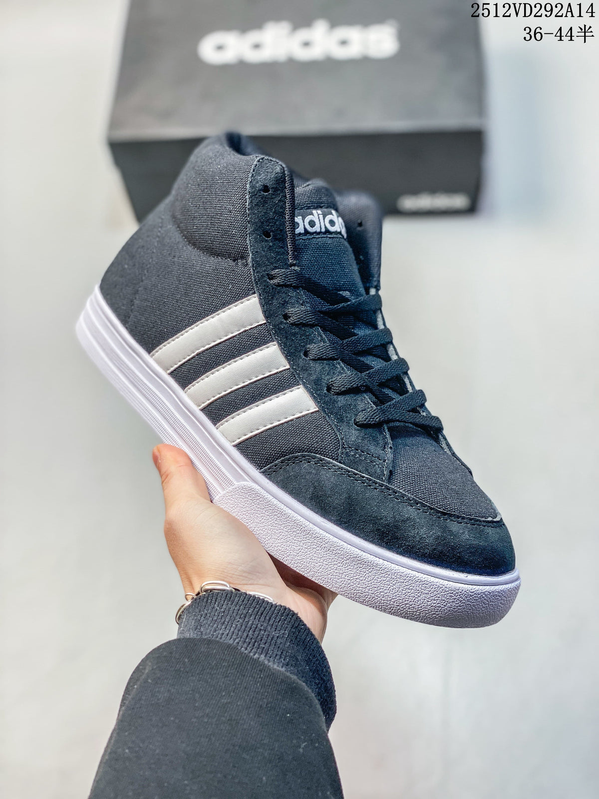 Angled side view of the navy Adidas high-top sneaker with white stripes and sole