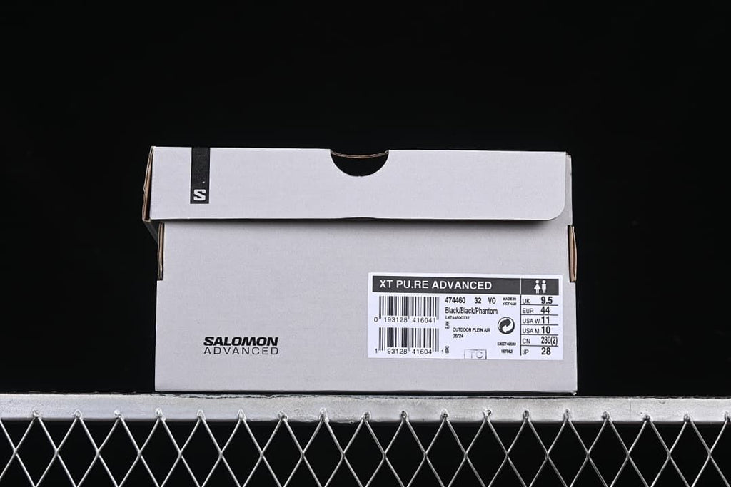 Shoe box label identifying XT Pure Advanced, model code 474460, and color Black/Black/Phantom.