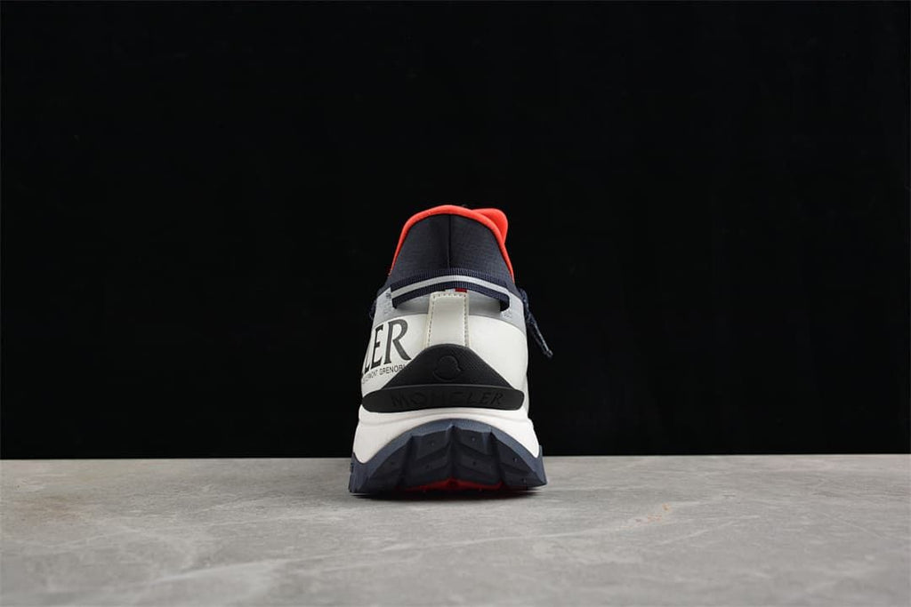 Rear view showing the sneaker's heel and chunky outsole.