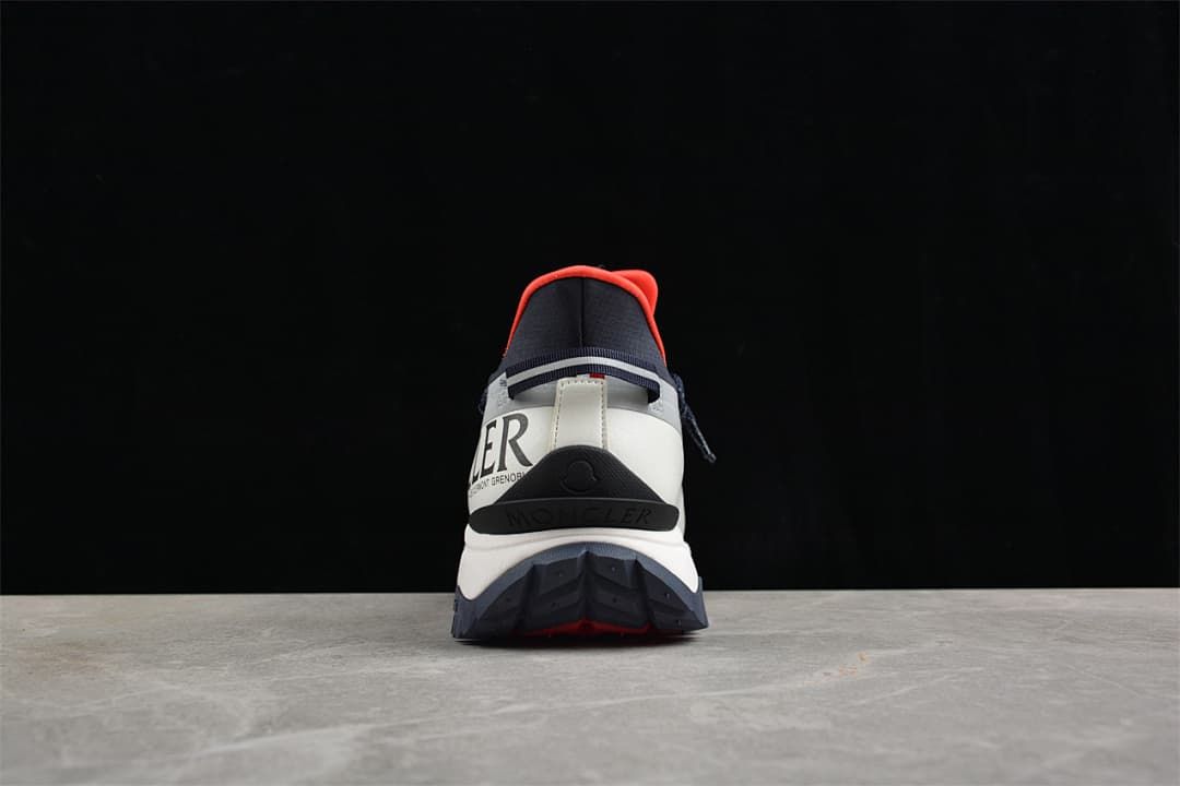 Rear view showing the sneaker's heel and chunky outsole.