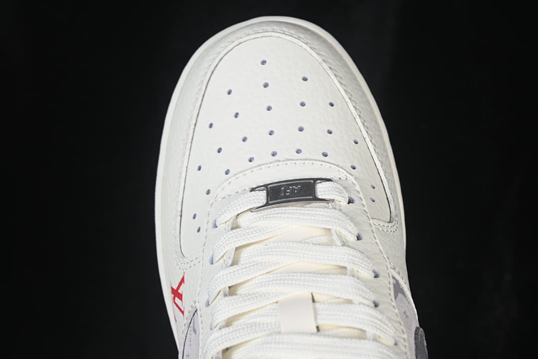 Top-down close-up of the perforated toe box and laces