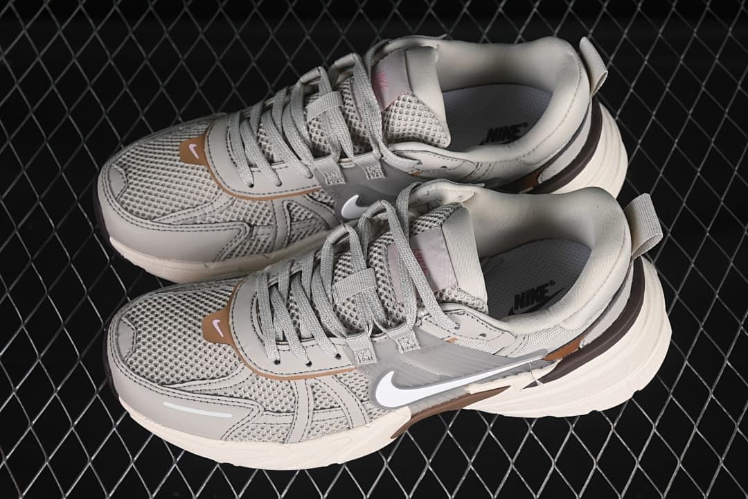 Pair of grey and off-white sneakers shown from above