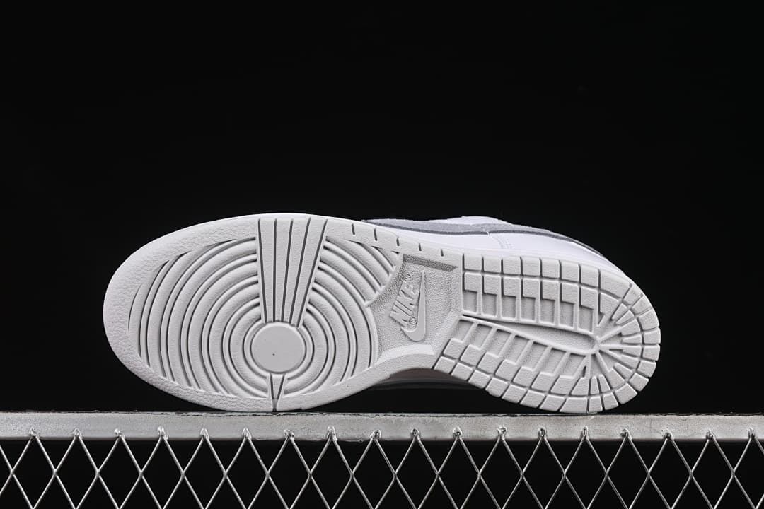 Bottom view showing the patterned white rubber outsoles