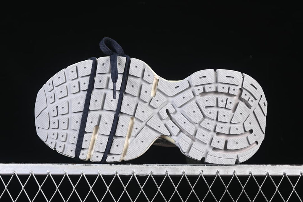 Underside view showing the segmented outsole tread.