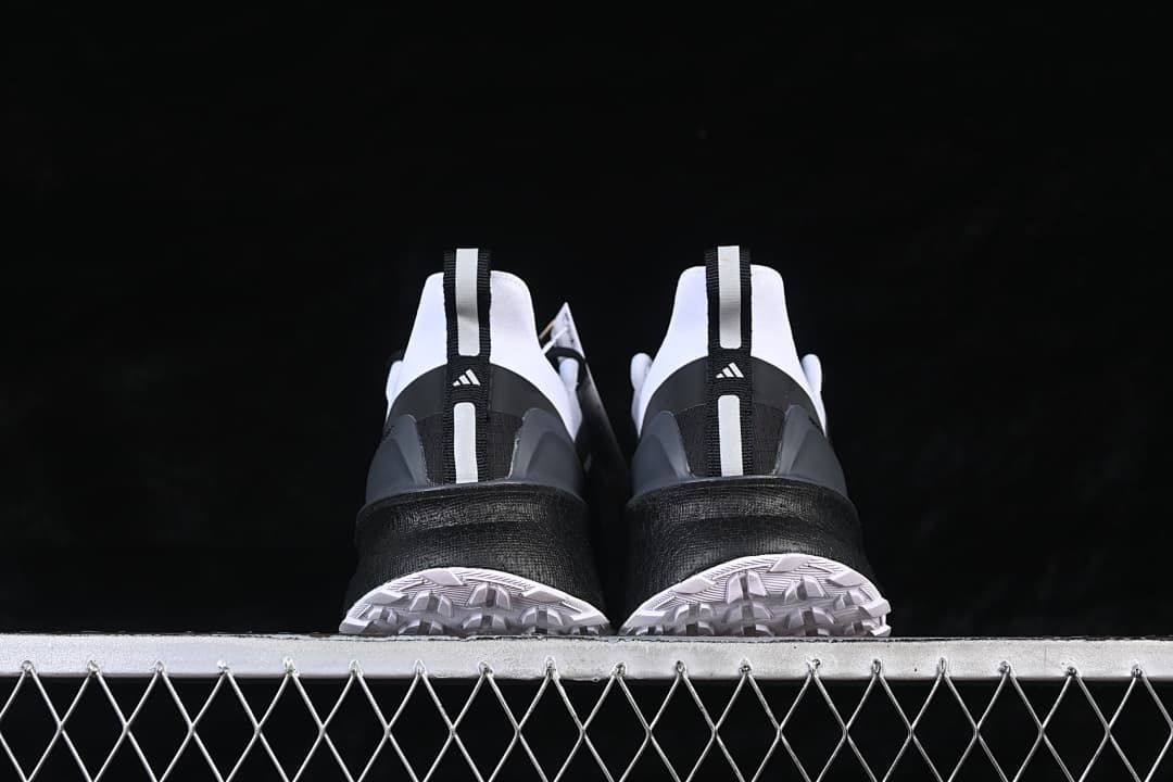 Rear view of the pair showing heel tabs and outsole edges