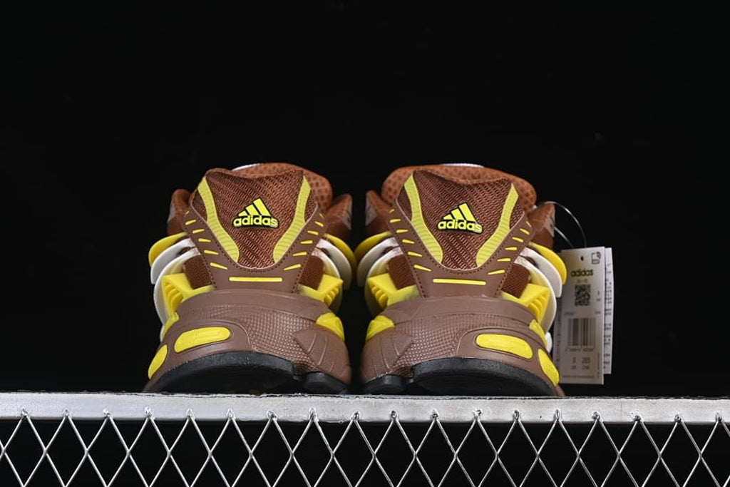Rear view of the pair showing heel branding and yellow accents