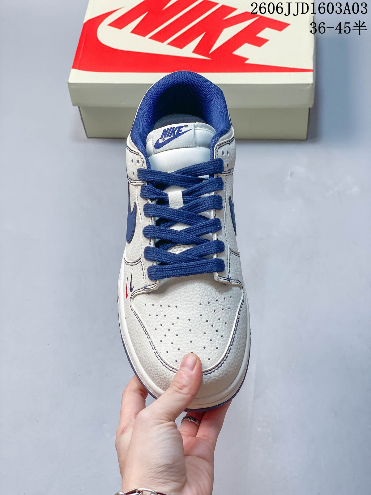 Front view showing the perforated toe and blue laces