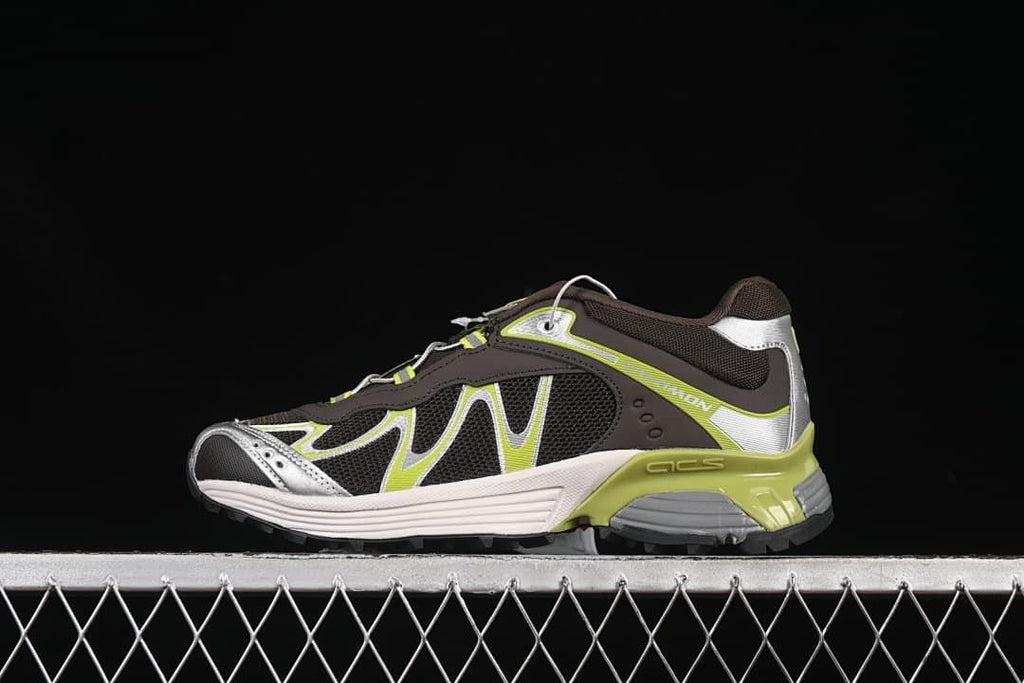 Side profile of dark brown Salomon XT-Whisper sneakers with silver and lime accents