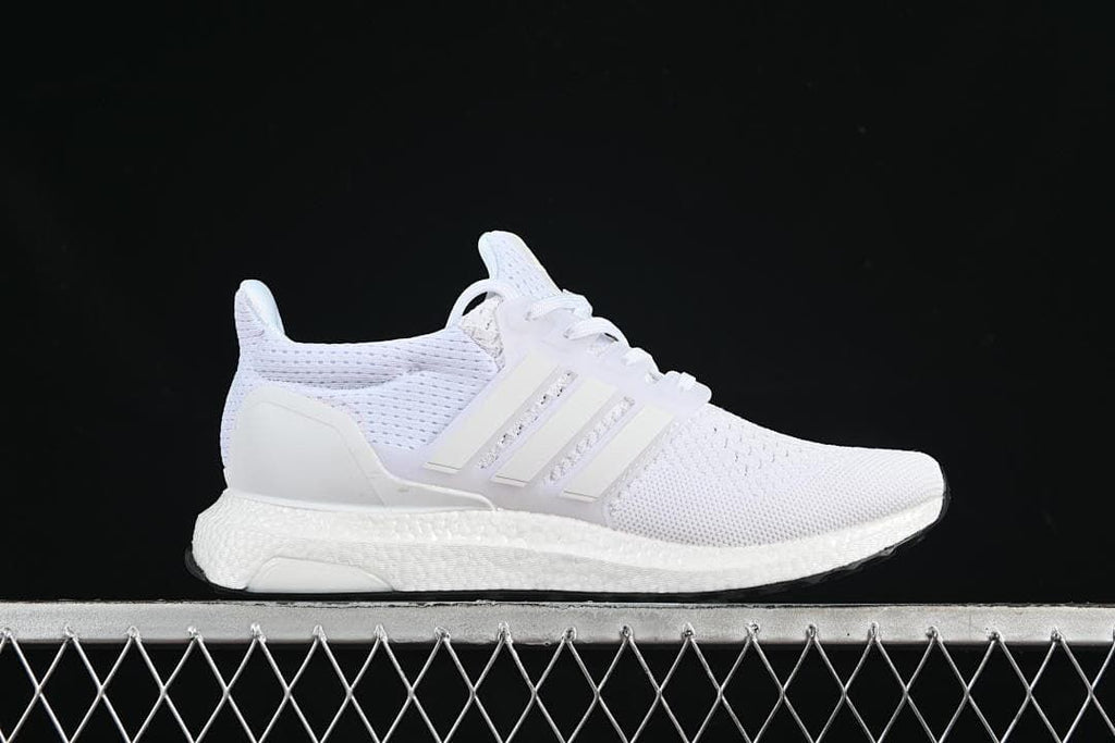 Side profile of one white sneaker.