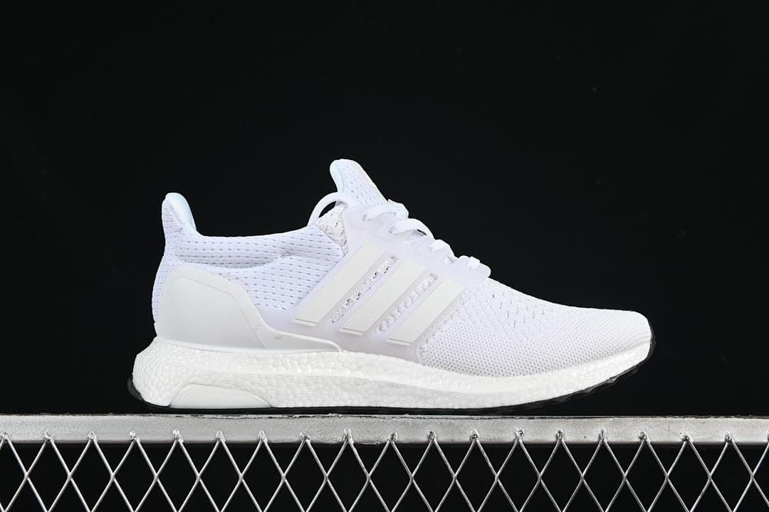 Side profile of one white sneaker.