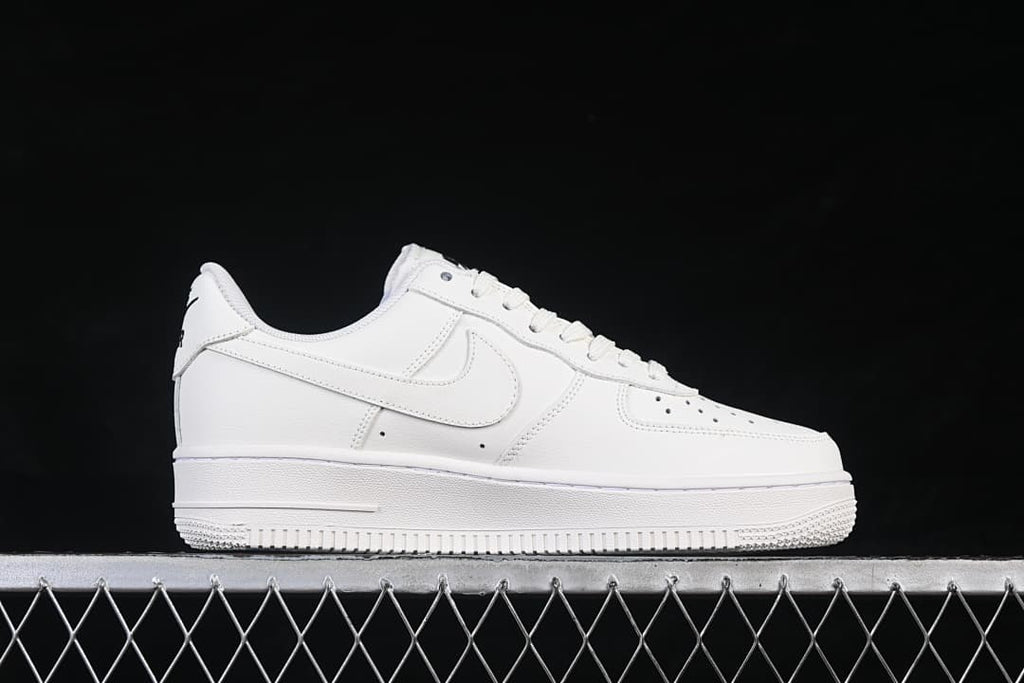 Side profile of the white low-top sneaker