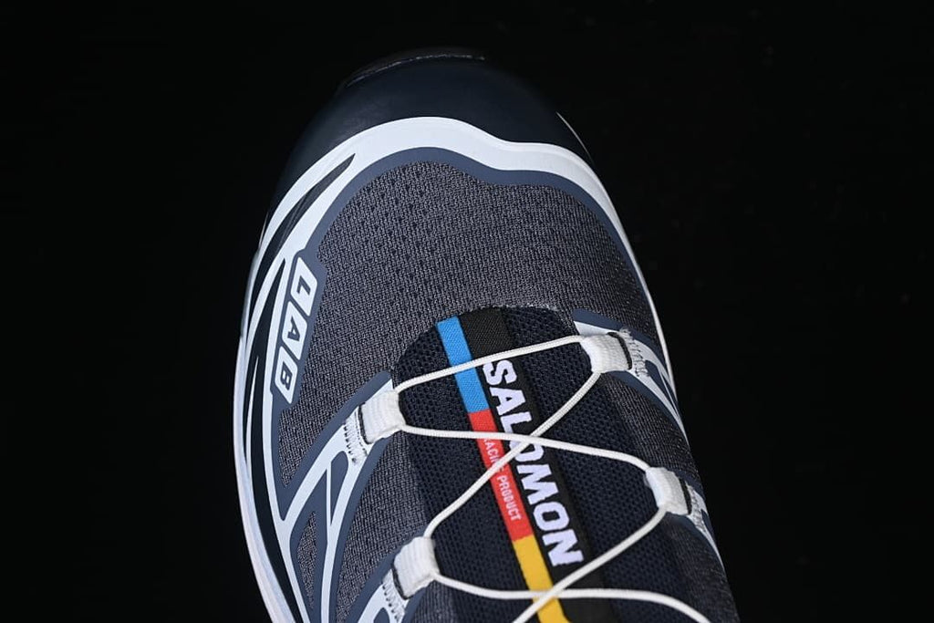 Top view of the gray and navy toe and lacing.