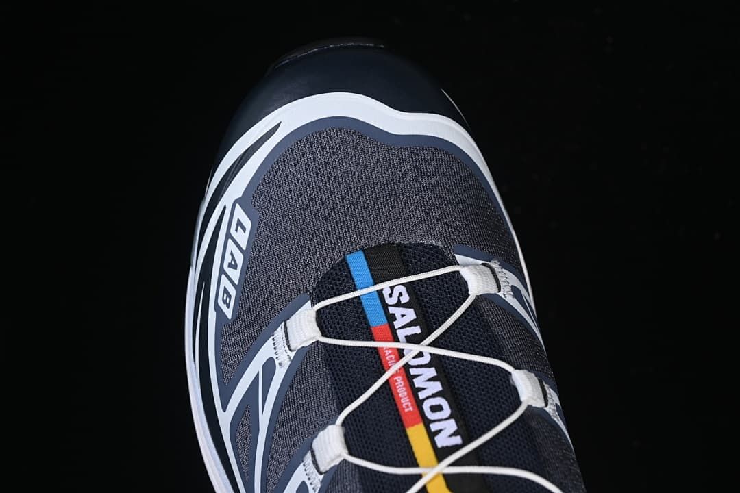 Top view of the gray and navy toe and lacing.