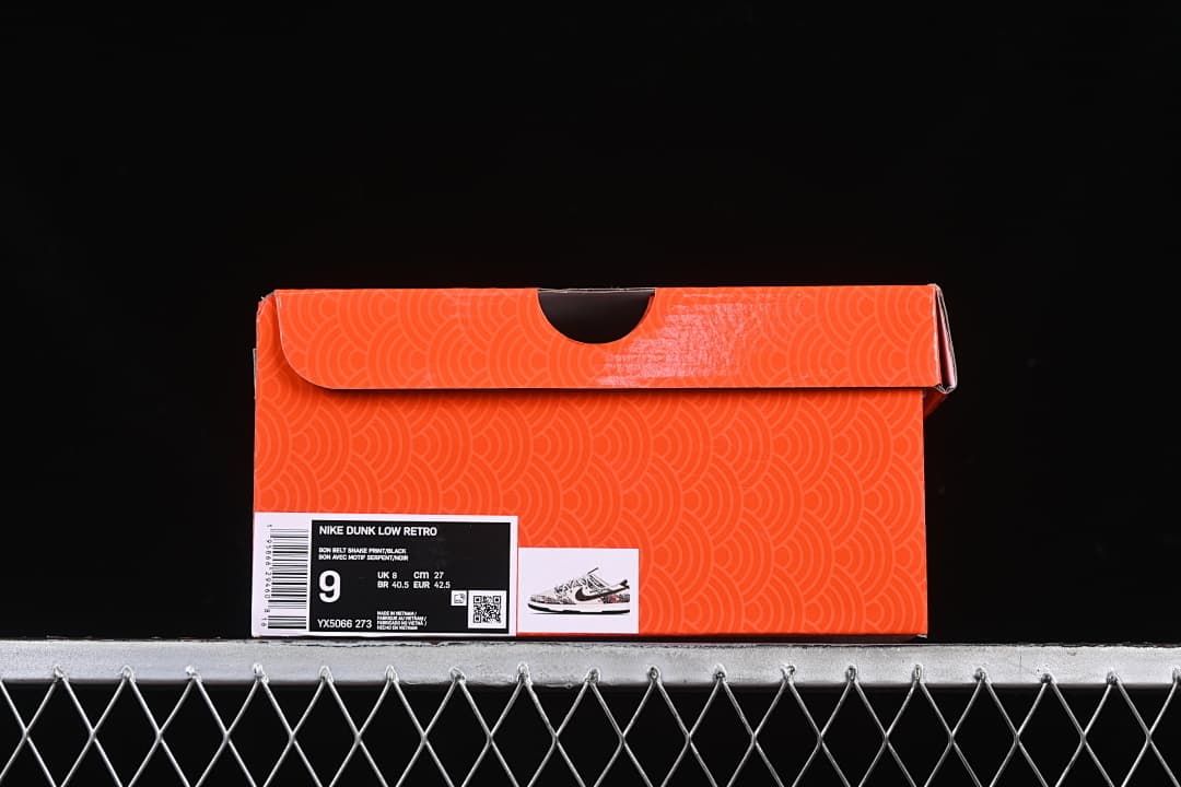 Orange shoe box showing a label with the pictured sample size and style code