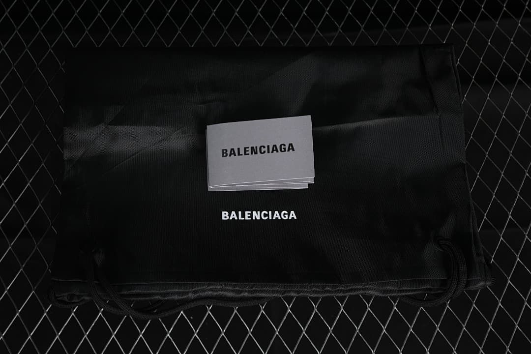 Black Balenciaga-branded fabric bag and cards