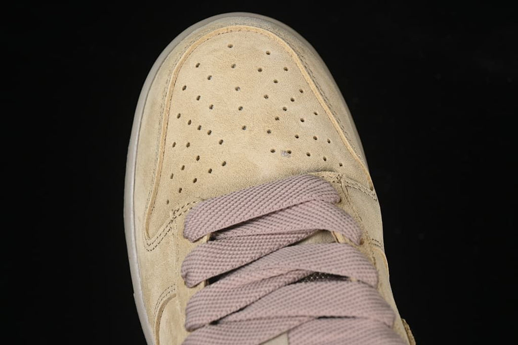 Top view of perforated toe and laces