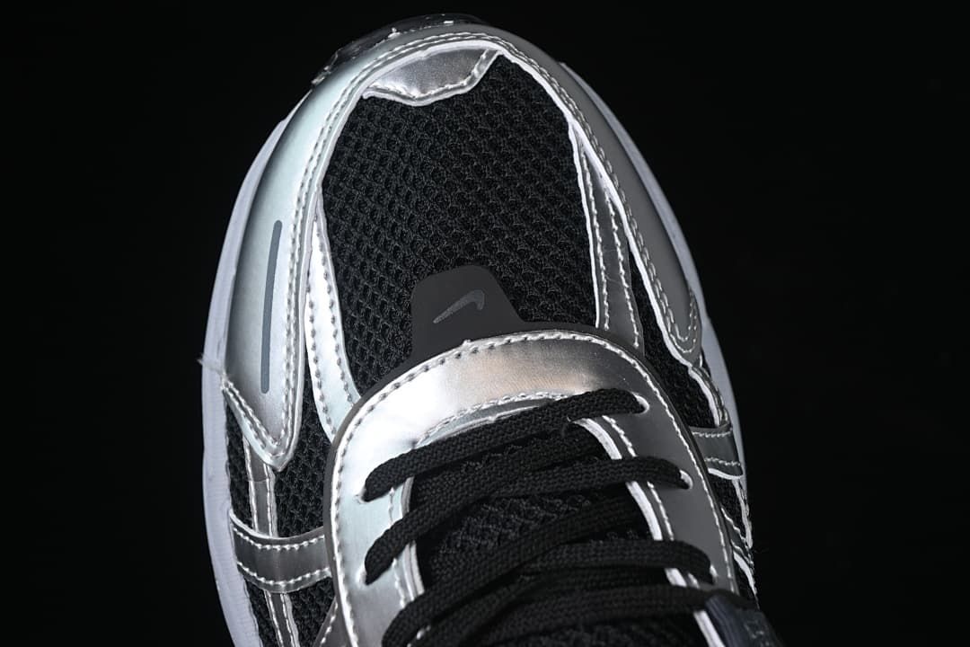 Top view of the mesh toe box and silver-colored overlays