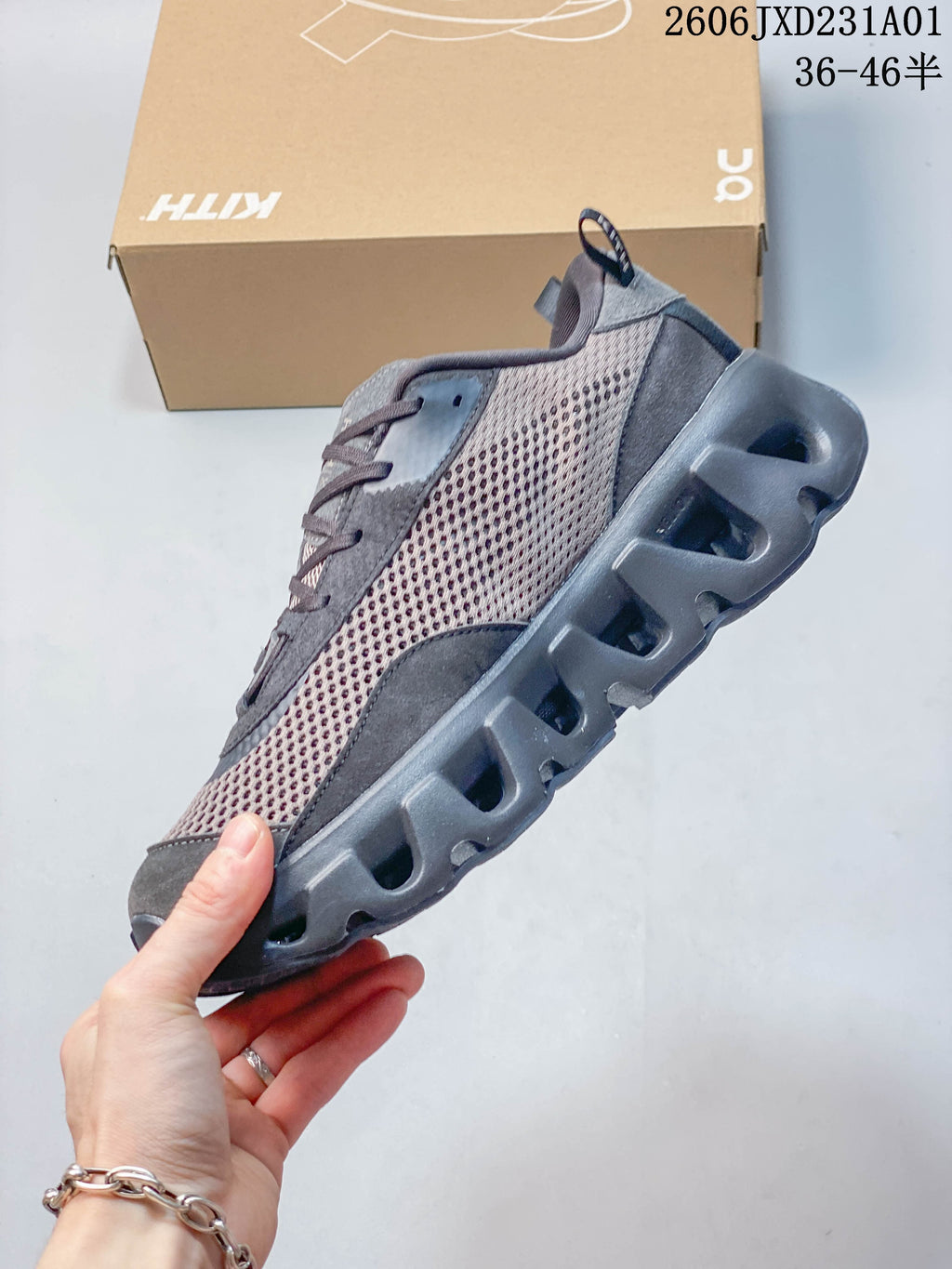 Side view highlighting mesh panels and the sculpted sole