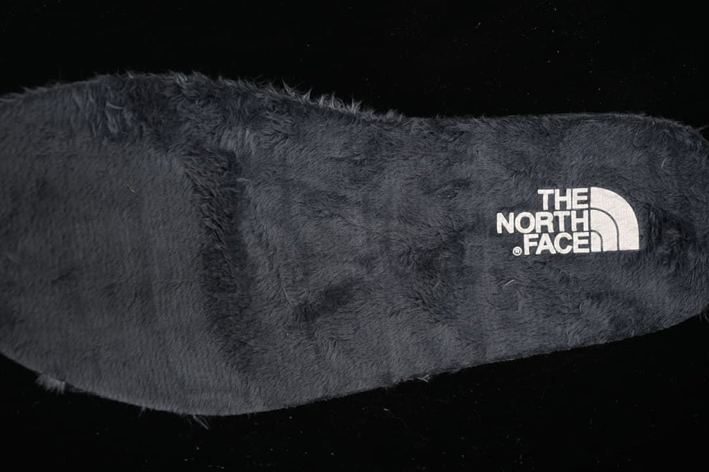Close-up of the plush-looking dark interior lining and logo
