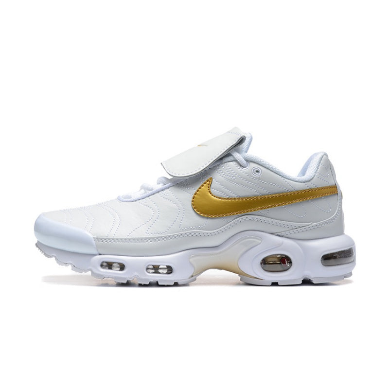 White Nike Air Max Plus sneaker with a gold swoosh and strap across the upper.