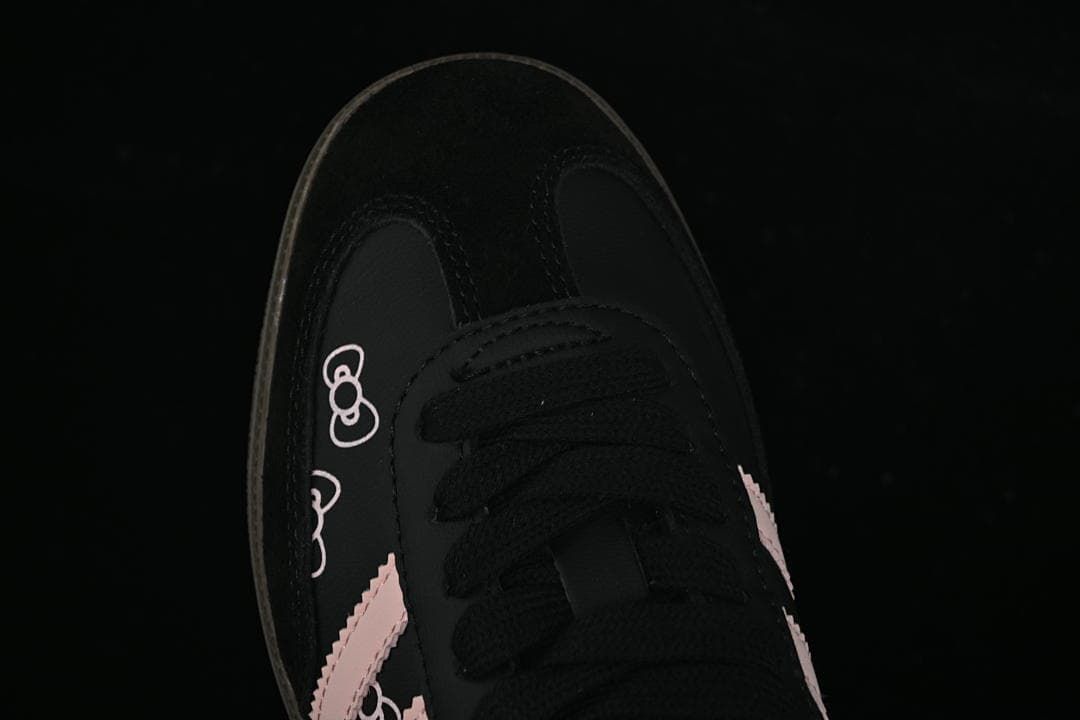 Top view of the toe and black lace area with character graphics