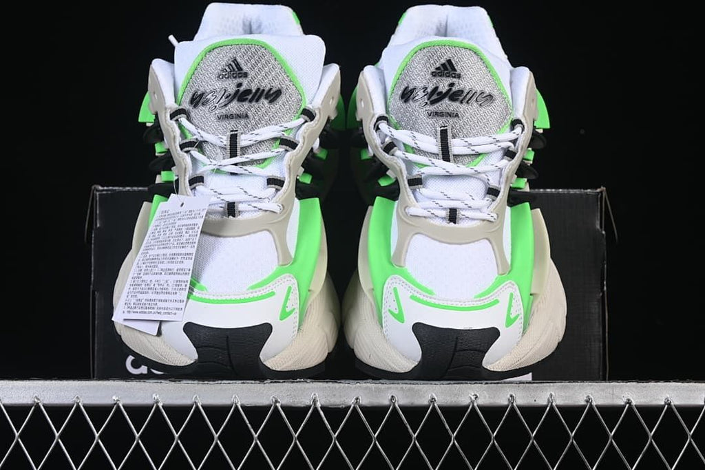 Front view of the pair showing the tongues, laces, and contrasting toe details.