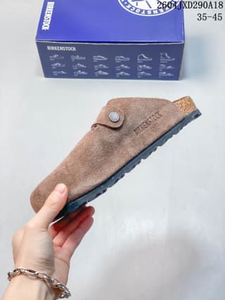 Side profile showing the brown upper, adjustable buckle strap and textured outsole.