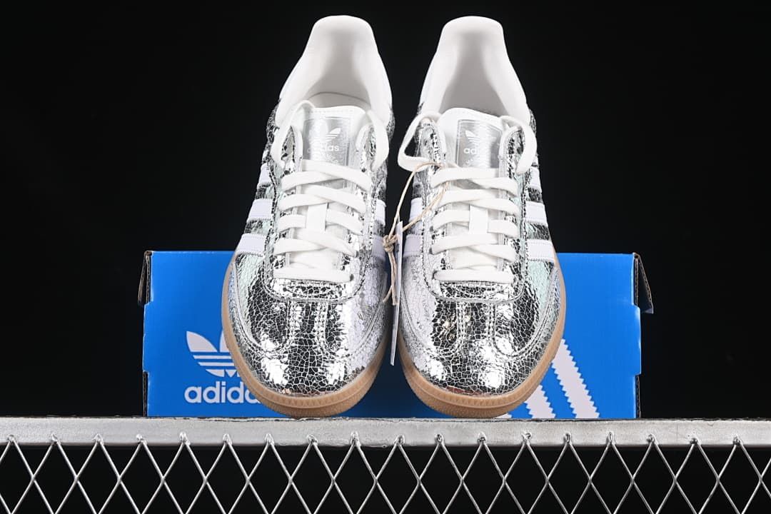 Front view of the pair displayed on a blue shoe box