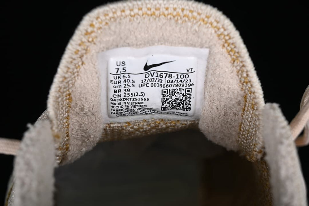 Shoe tongue size label showing US 7.5, UK 6.5, EU 40.5, CM 25.5, and style code DV1678-100.
