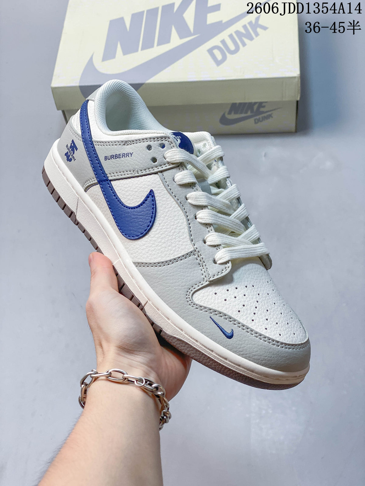 Angled side view showing blue Swoosh detailing and visible Burberry text
