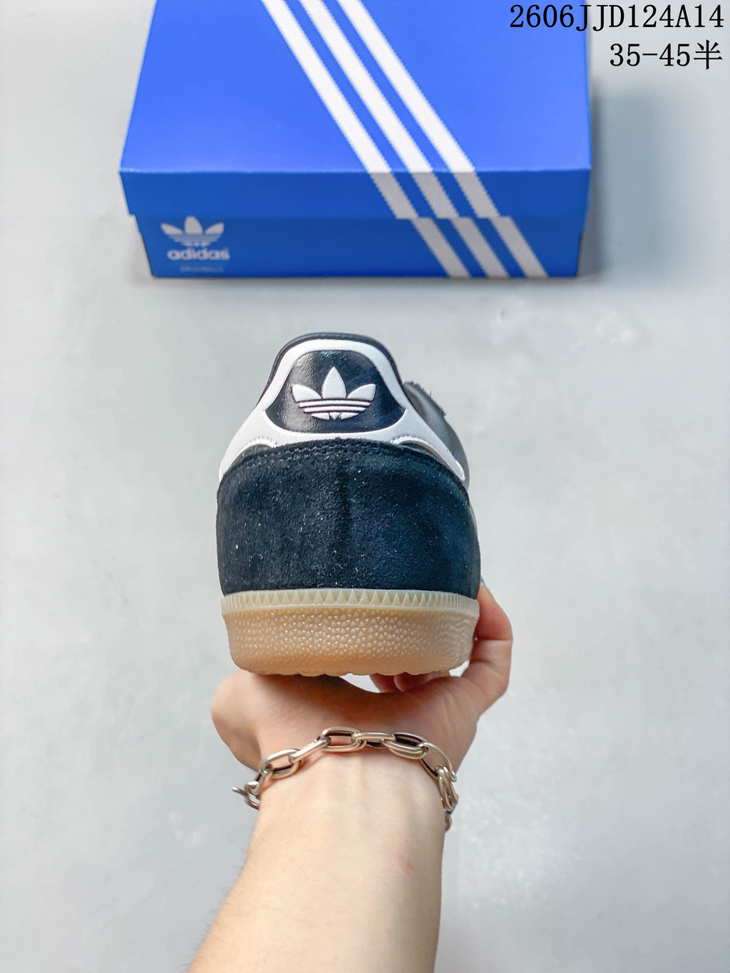 Rear view showing the contrasting heel panel and gum-colored outsole