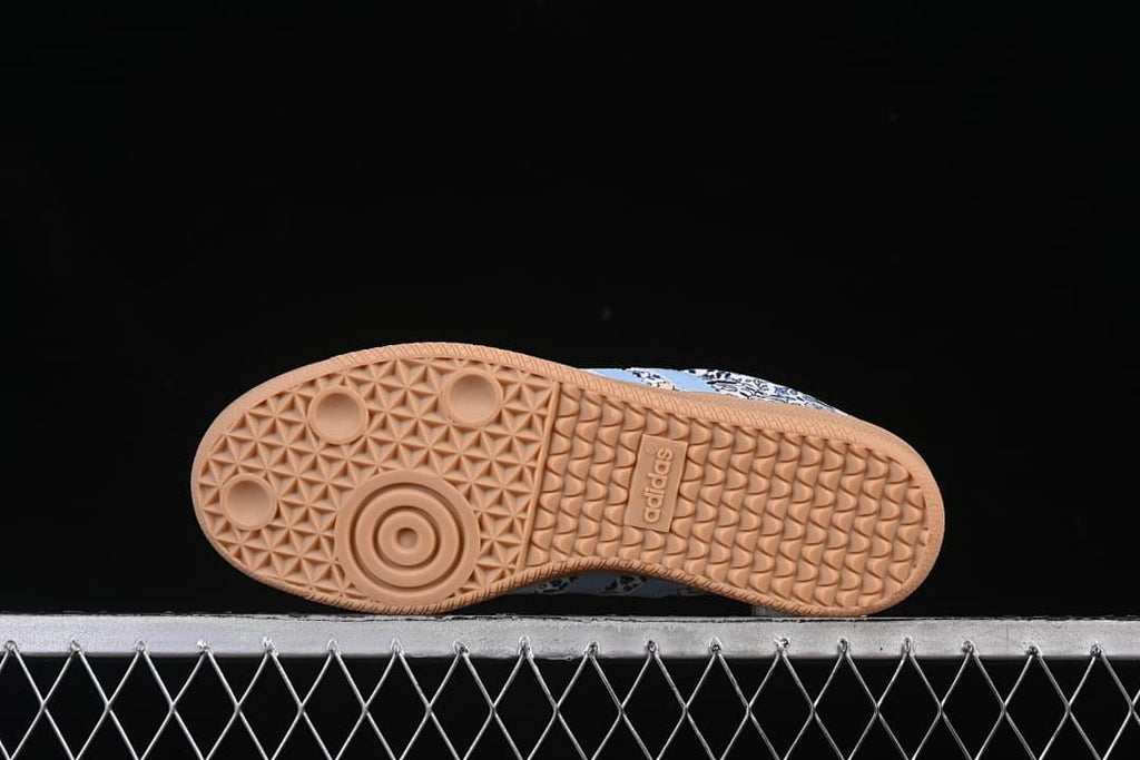 Underside view of the gum-colored outsole with patterned tread