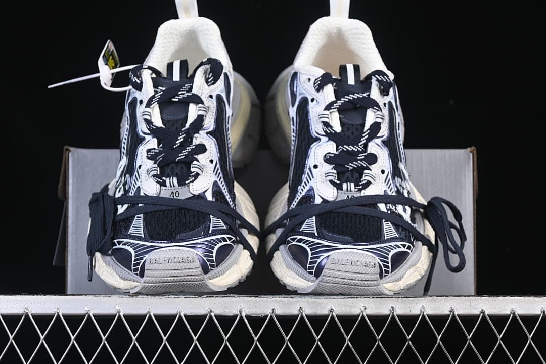 Front view of the pair showing the toe design and contrasting laces.