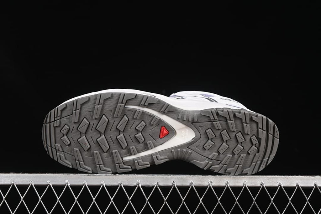 Underside view showing the lugged outsole tread