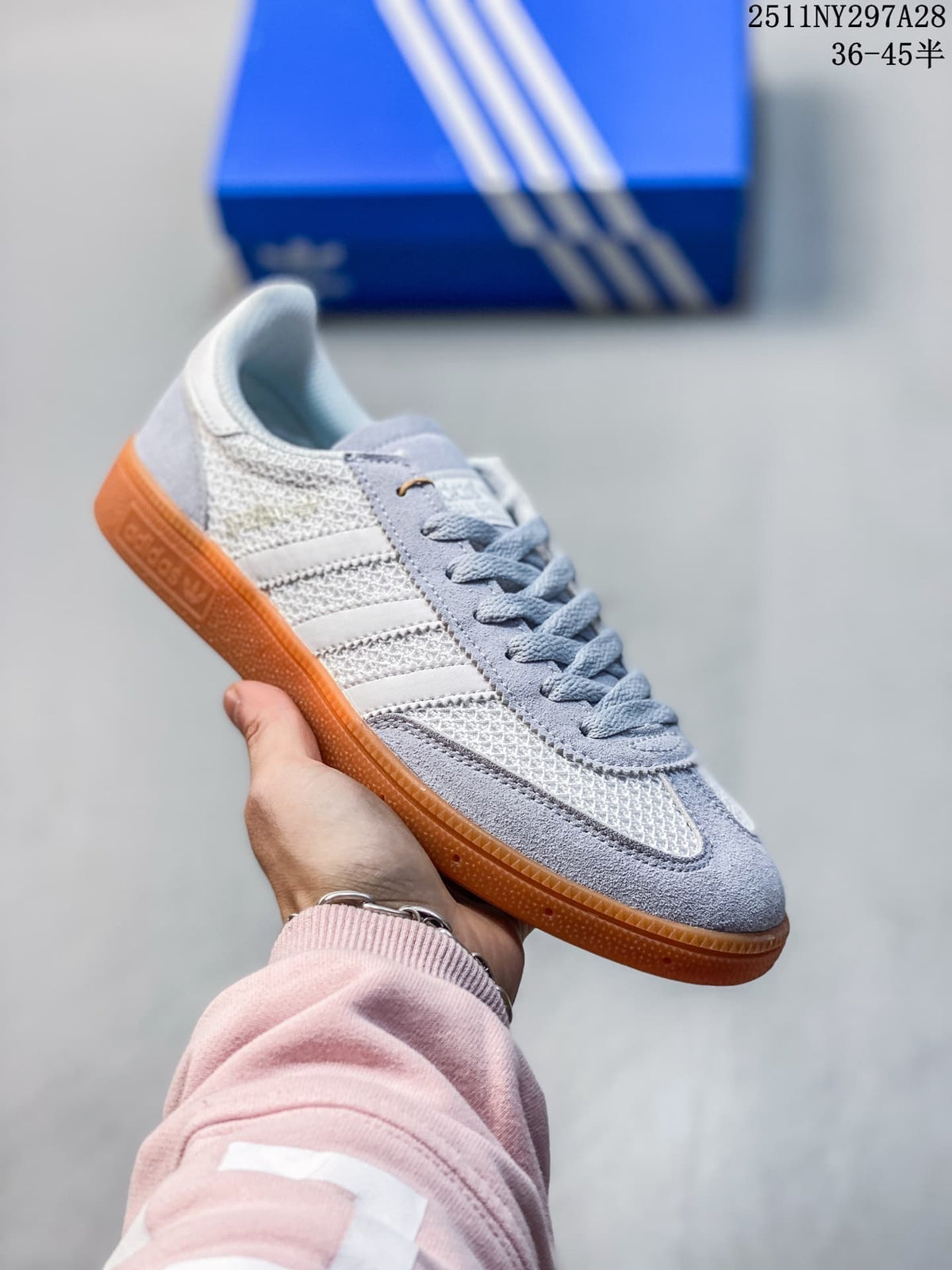 Light blue and white adidas Handball Spezial sneaker with a gum outsole