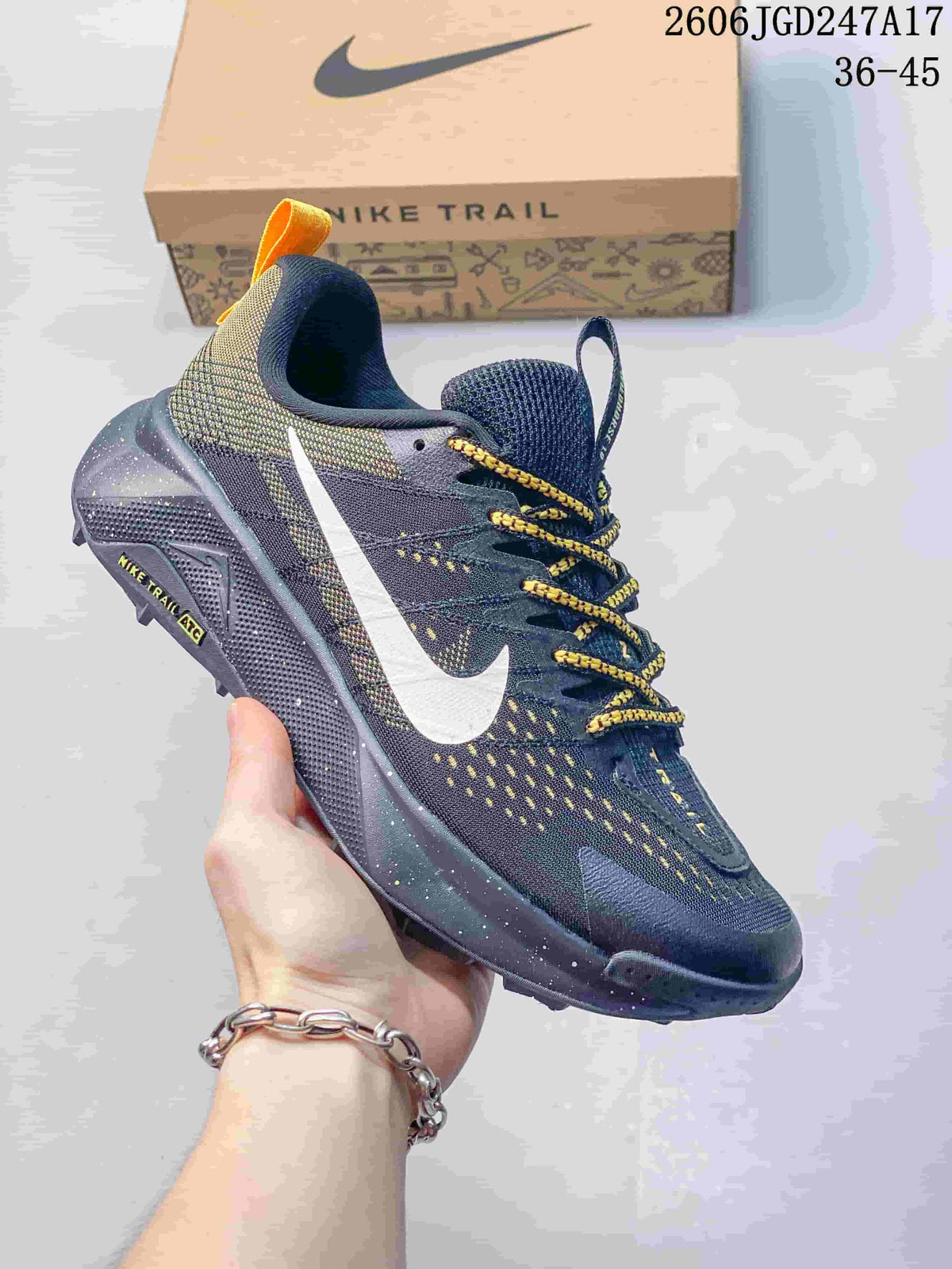 Dark navy Nike Wildhorse 10 trail running shoe with yellow accents