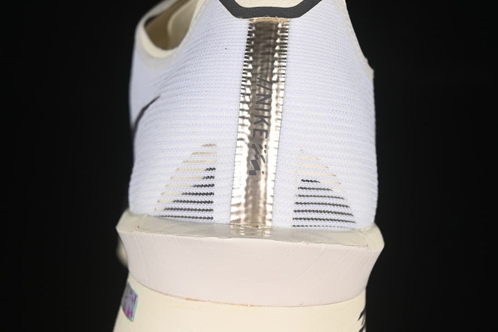 Rear view of the shoe showing the heel panel and sculpted midsole