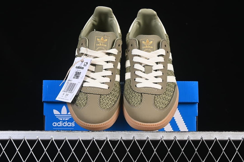 Front view of the pair with branded tags and box