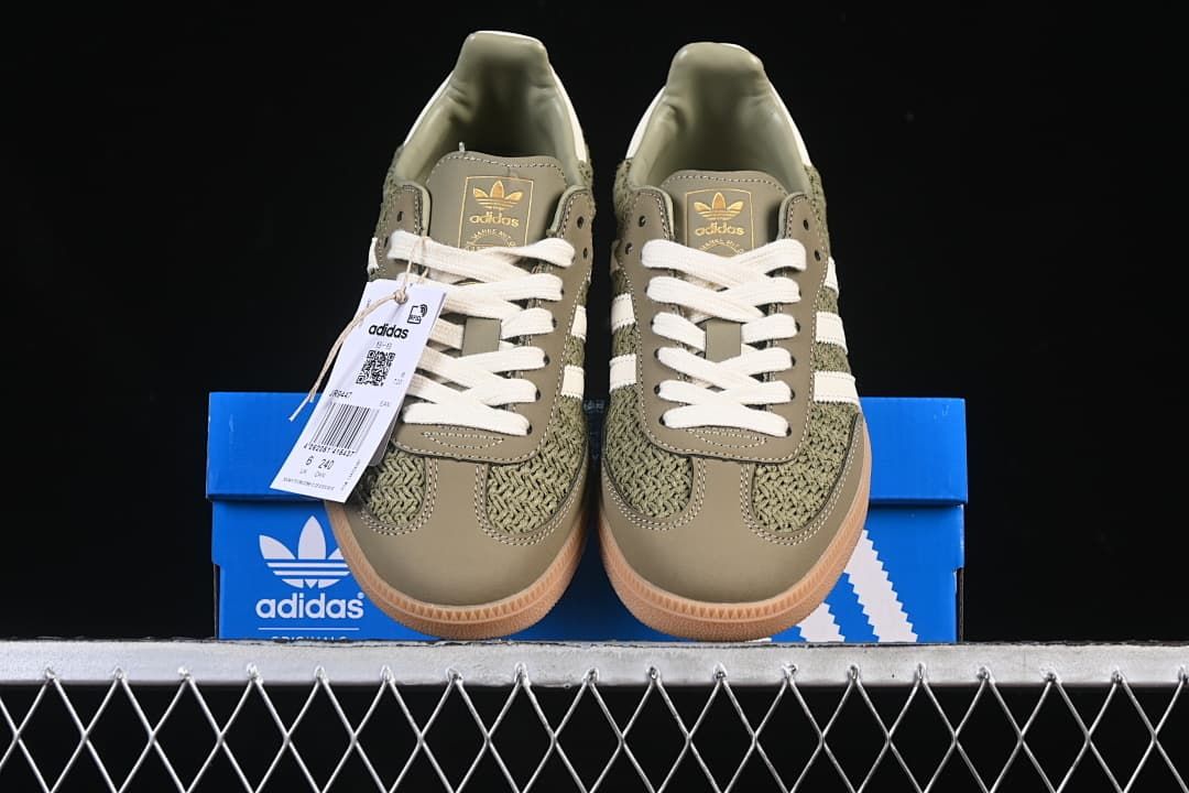 Front view of the pair with branded tags and box