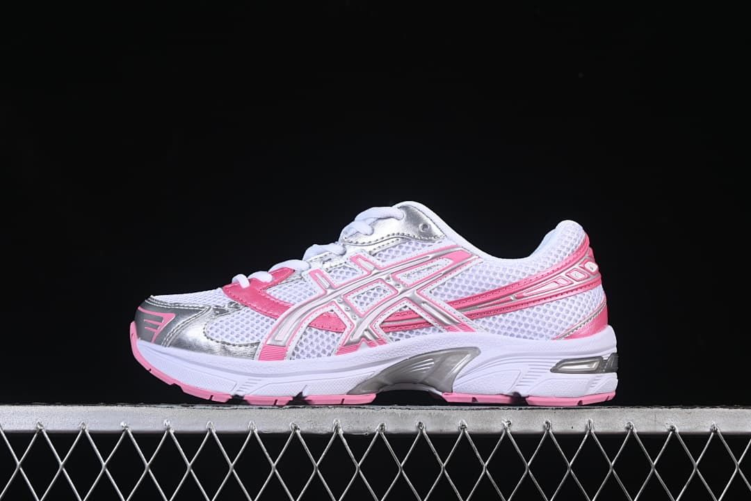 Side profile of the ASICS GEL-1130 sneaker in white, pink, and silver.