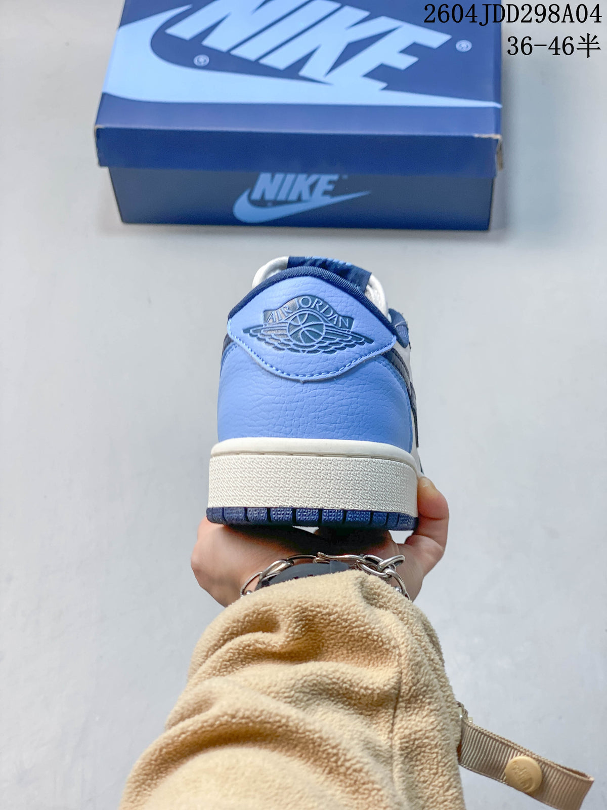 Rear view showing the blue heel and embossed wing logo